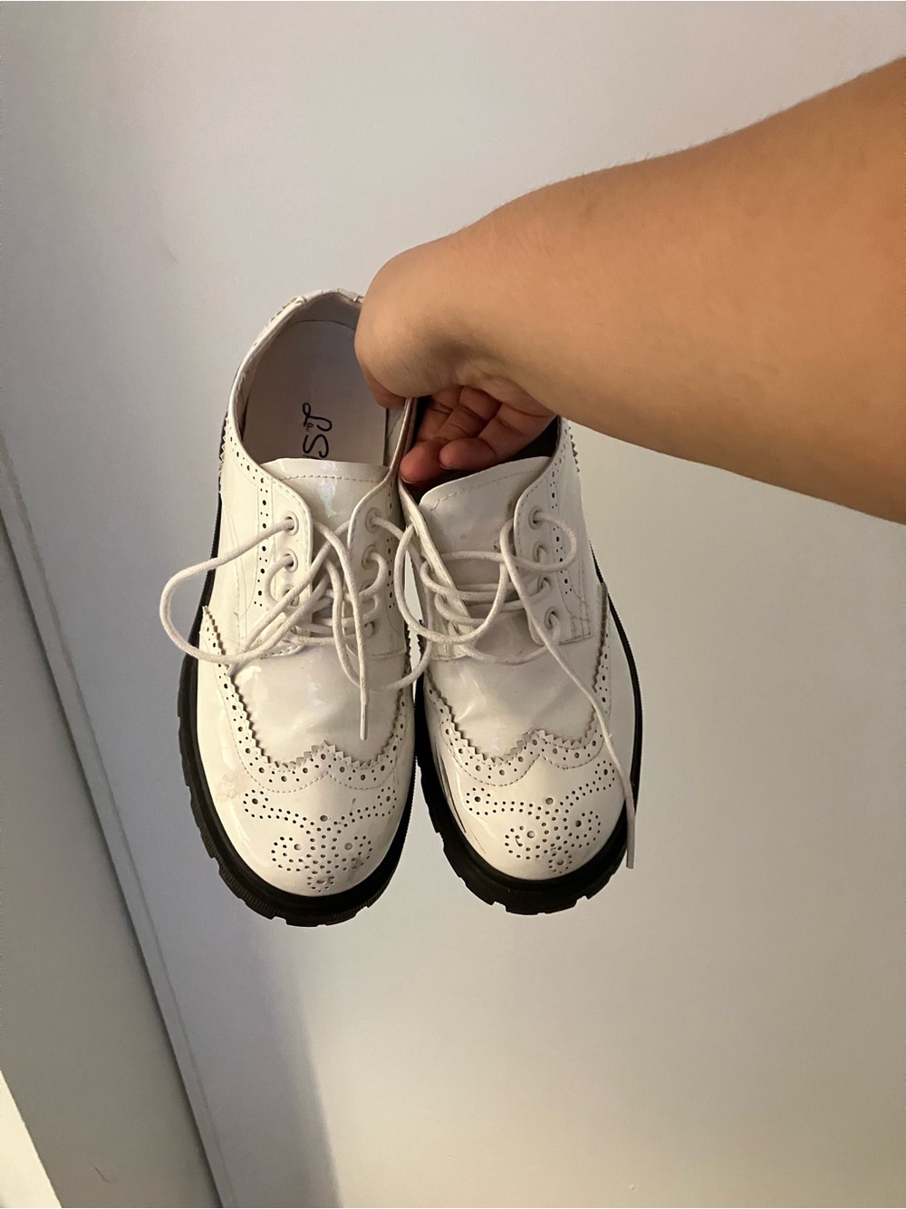 White and black platform shoes